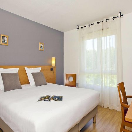 Sejours & Affaires Annecy Le Pont Neuf Aparthotel Cran-Gevrier Bagian luar foto